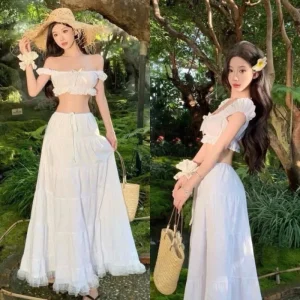 Set váy nữ trắng croptop trễ vai đính nơ kèm chân váy dài xoè dáng công chúa đi biển du lịch